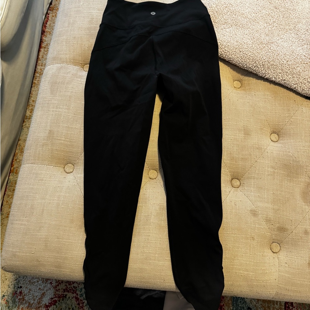 Black Lulu lemon leggings with mesh side